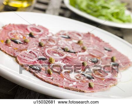 Carpaccio of Beef Fillet with Rocket salad View Large Photo Image Stock Image - Carpaccio of Beef Fillet with Rocket salad. Fotosearch