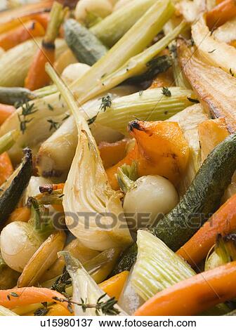 Honey and Thyme Roasted Baby Vegetables View Large Photo Image Stock Photo - Honey and Thyme Roasted Baby Vegetables. Fotosearch