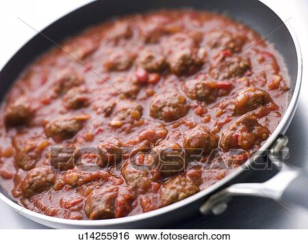 Stock Photograph - Meatballs in a Tomato Sauce. Fotosearch