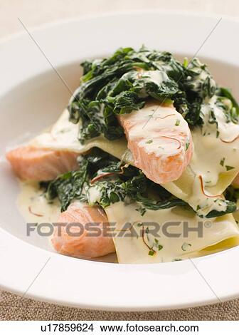 Open Lasagne of Salmon and Spinach with a Saffron Cream View Large Photo Image Picture - Open Lasagne of Salmon and Spinach with a Saffron Cream. Fotosearch