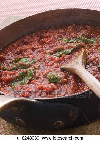 Stock Image - Pan of Fresh Tomato Sauce. Fotosearch