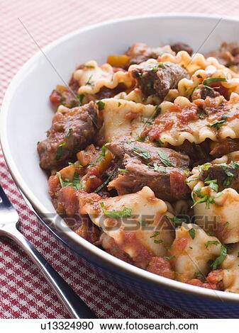Strips of Fillet Steak in a Chilli Tomato Sauce with Trompetti Pasta View Large Photo Image Stock Image - Strips of Fillet Steak in a Chilli Tomato Sauce with Trompetti Pasta. Fotosearch