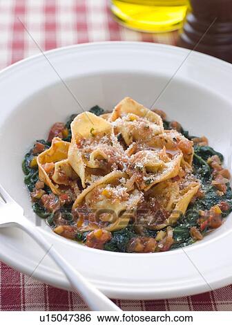Vegetable Tortellini with Spinach and Tomato Salsa View Large Photo Image Stock Photograph - Vegetable Tortellini with Spinach and Tomato Salsa. Fotosearch