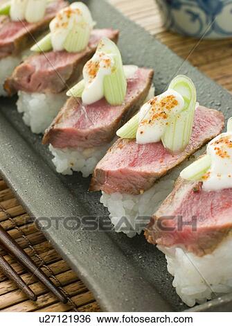 Stock Photograph - Beef Nigri with Horseradish and Wasabi Cream. Fotosearch