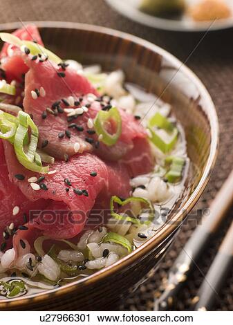 Stock Image - Bowl of Beef Fillet and Rice soup. Fotosearch