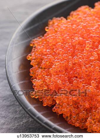 Stock Image - Bowl of Flying Fish Roe. Fotosearch