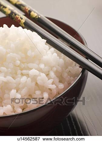 Bowl of Koshihikari Rice with chop sticks View Large Photo Image Stock Photo - Bowl of Koshihikari Rice with chop sticks. Fotosearch