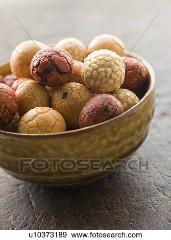 Stock Photo - Bowl of Peanut Rice Crackers. Fotosearch