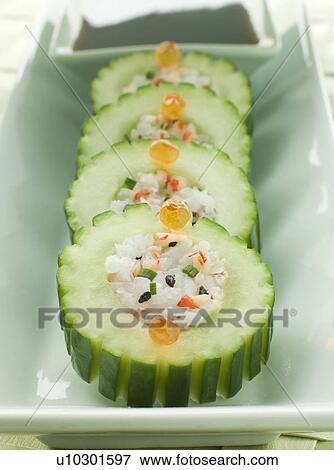 Stock Photo - Cucumber Sushi Roll with Crayfish and a Soy Dip. Fotosearch