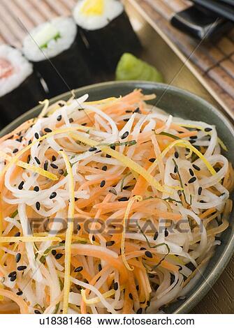 Daikon and Carrot Salad with Sesame Sushi and Wasabi View Large Photo Image Stock Photo - Daikon and Carrot Salad with Sesame Sushi and Wasabi. Fotosearch
