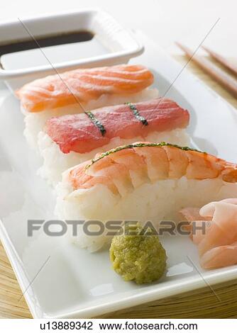 Hand Molded Seafood Sushi Wasabi Soy Sauce and Sushi ginger View Large Photo Image Stock Image - Hand Molded Seafood Sushi Wasabi Soy Sauce and Sushi ginger. Fotosearch