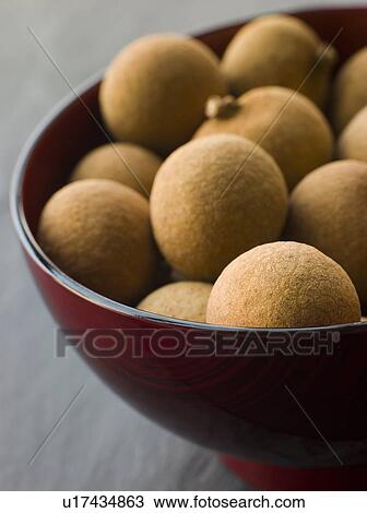 Longan in Wooden Bowl View Large Photo Image Stock Image - Longan in Wooden Bowl. Fotosearch