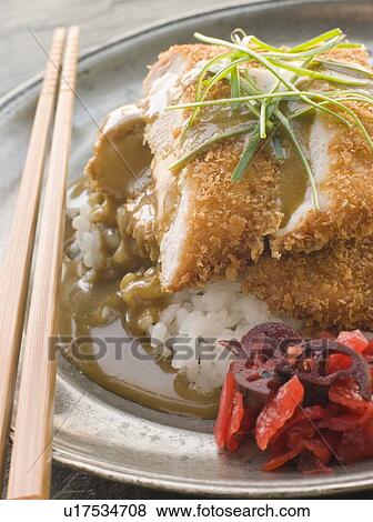 Plated Tonkatsu with Vinegar RiceCurry Sauce and Pickled red Radish View Large Photo Image Stock Photo - Plated Tonkatsu with Vinegar RiceCurry Sauce and Pickled red Radish. Fotosearch