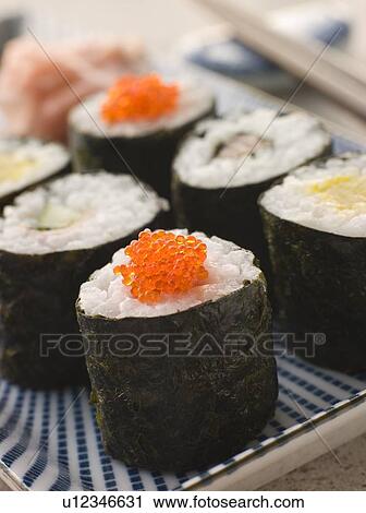 Stock Image - Small Rolled Sushi on a Plate. Fotosearch
