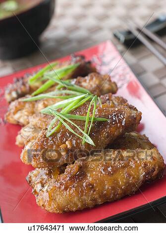 Sweet Spicy Chicken Winglets and Sukiyaki Sauce View Large Photo Image Stock Image - Sweet Spicy Chicken Winglets and Sukiyaki Sauce. Fotosearch