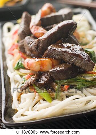 Teriyaki Beef Fillet and Tiger Prawns with Udon Noodles View Large Photo Image Stock Photography - Teriyaki Beef Fillet and Tiger Prawns with Udon Noodles. Fotosearch
