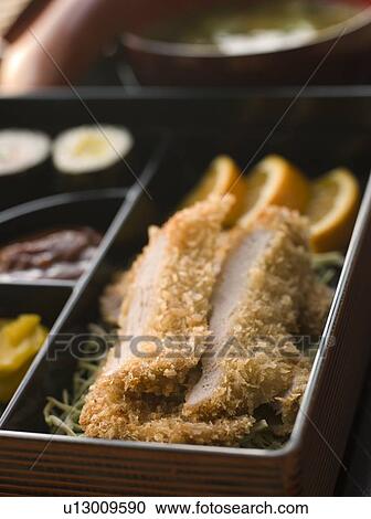 Stock Image - Tonkatsu Plated with Rice Miso Soup and Pickles. Fotosearch
