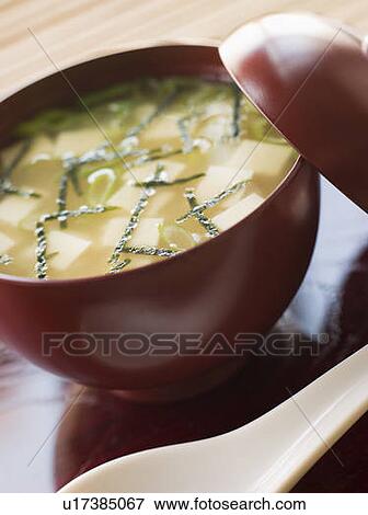 Stock Photo - Wok Fried Pork and Ginger Cabbage on Rice. Fotosearch