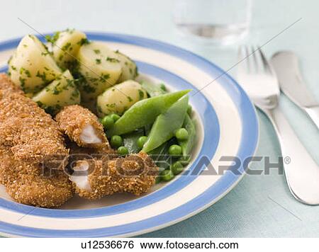 Chicken Goujons with Herb Buttered New Potatoes and Green Vegetables View Large Photo Image Stock Photograph - Chicken Goujons with Herb Buttered New Potatoes and Green Vegetables. Fotosearch