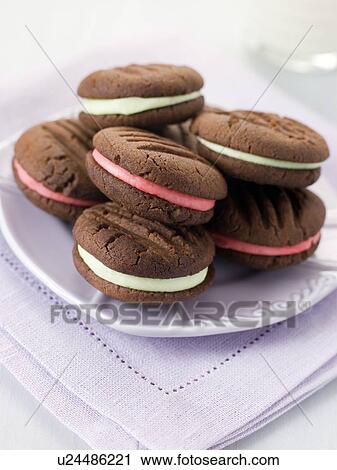 Stock Image - Chocolate Kiss Biscuits filled with Peppermint Cream. Fotosearch
