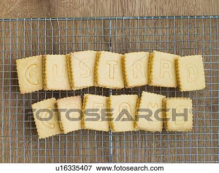 Custard Cream Biscuits on a Cooling Rack View Large Photo Image Stock Photo - Custard Cream Biscuits on a Cooling Rack. Fotosearch
