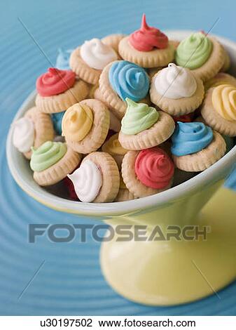 Stock Image - Dish of Iced Gem Biscuits. Fotosearch