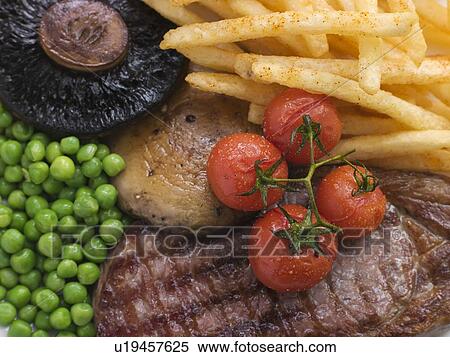 Stock Photography - Sirloin Steak Chips and Grill Garnish. Fotosearch