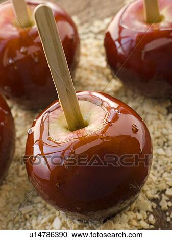 Toffee Apples on Crushed Toasted Almonds View Large Photo Image Stock Image - Toffee Apples on Crushed Toasted Almonds. Fotosearch