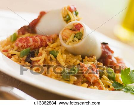 Baby Squid Stuffed with Saffron and Seafood Rice View Large Photo Image Picture - Baby Squid Stuffed with Saffron and Seafood Rice. Fotosearch