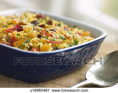 Stock Photo - Braised Saffron Rice with Dried Fruits. Fotosearch
