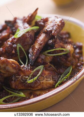 Chili and Garlic Chicken Wings View Large Photo Image Stock Photograph - Chili and Garlic Chicken Wings. Fotosearch