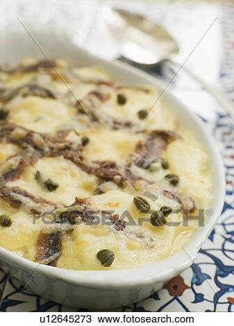 Stock Image - Dish of Spanish-Style Potato Gratin. Fotosearch
