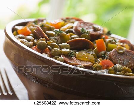 Stock Image - Green Lentil and Chorizo Sausage Stew. Fotosearch
