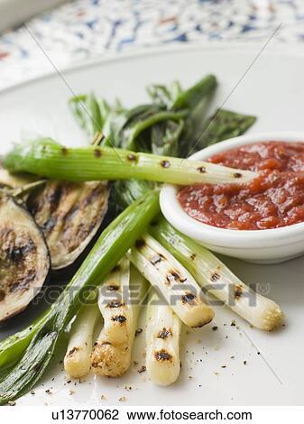 Griddled Spring Onions and Romesca Sauce- La Colcotada View Large Photo Image Stock Image - Griddled Spring Onions and Romesca Sauce- La Colcotada. Fotosearch