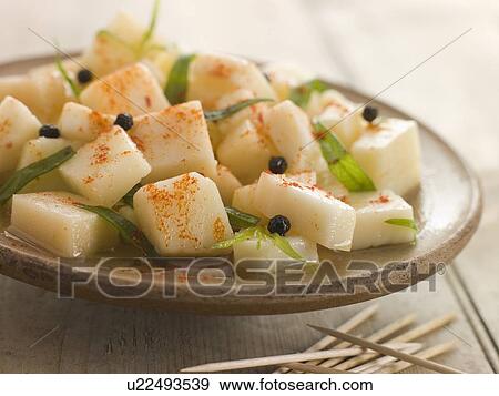 Manchego Marinated in Chili and Tarragon View Large Photo Image Stock Photo - Manchego Marinated in Chili and Tarragon. Fotosearch