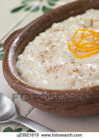 Stock Photo - Orange and Cinnamon Rice Pudding. Fotosearch