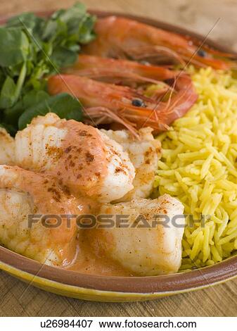 Saute of Monkfish Prawns and Rice with Pimento Cream View Large Photo Image Stock Photo - Saute of Monkfish Prawns and Rice with Pimento Cream. Fotosearch