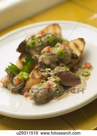 Stock Photo - Sauteed Chicken Livers in a Sherry Sauce. Fotosearch