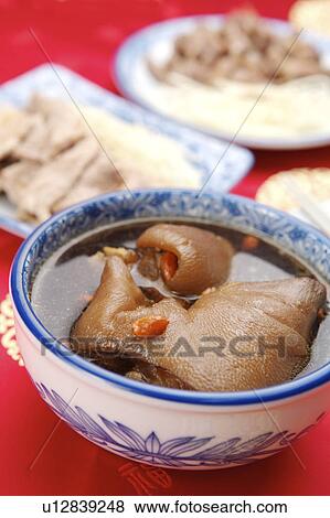 Close-up of a bowl of angelica pig knuckle View Large Photo Image Stock Photo - Close-up of a bowl of angelica pig knuckle. Fotosearch