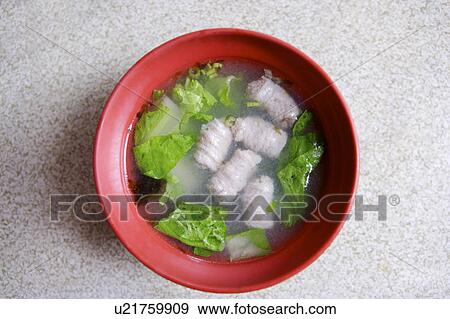 Stock Photo - Close-up of a bowl of fish ball soup. Fotosearch