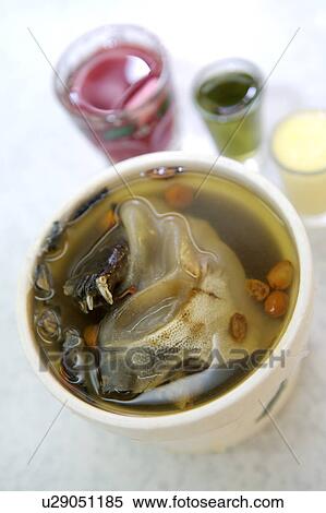 Stock Photography - Close-up of a bowl of turtle soup. Fotosearch