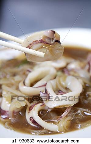 Stock Image - Close-up of cuttlefish with vegetables. Fotosearch