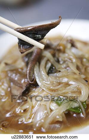 Stock Image - Close-up of eel noodles. Fotosearch
