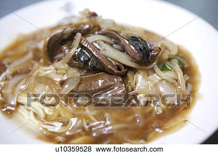 Stock Photo - Close-up of eel noodles. Fotosearch