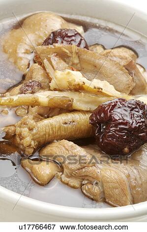 Stock Photo - Close-up of four herb chicken in the bowl. Fotosearch