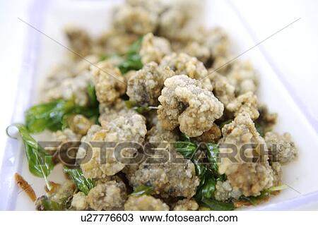 Close-up of fried oyster View Large Photo Image Stock Image - Close-up of fried oyster. Fotosearch