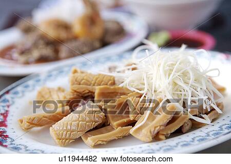 Stock Image - Close-up of squid on the plate. Fotosearch