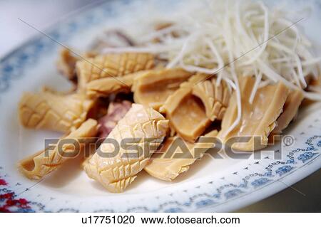 Stock Image - Close-up of squid on the plate. Fotosearch