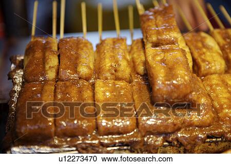 Stock Image - Close-up of stinky tofu. Fotosearch
