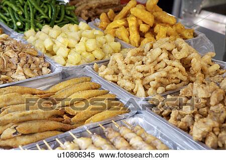 Stock Photography - Close-up of tempura and salt fried chicken. Fotosearch